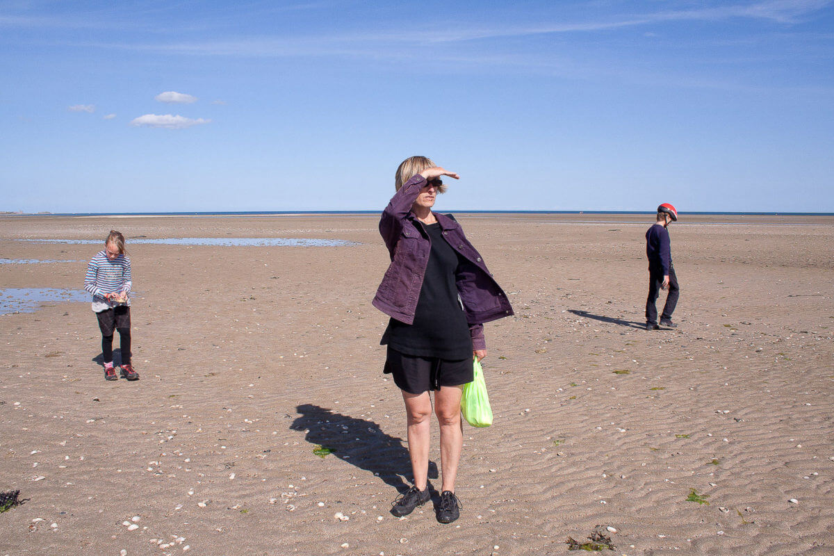 me on large normand beach with kids